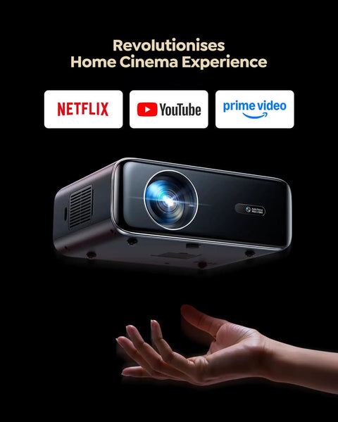 Smart Outdoor Projector With Built In Apps And 4K Support, WiFi And Bluetooth, Auto Focus, Dual Speakers above a hand.