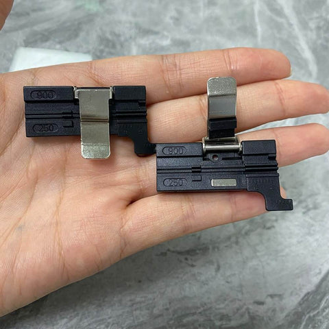 Hand holding 3 In 1 Fiber Cleaver, Fiber Holder And Fiber Fixture Clamp For FTTH 250um 900um Cables, Aluminum Alloy Construction, Black Finish