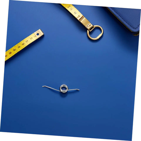 Ditch The Bad Springs! Grab This Awesome 20-Pack Trash Can Torsion Spring Kit With Corrosion Resistance. silver iron-nickel spring with ruler and ring