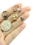 Real Deal 30 Pieces Heavy Duty Screwback Leather Rivet Kit with Pull Rings 8x6mm in hand showing silver, gold, black rivets.