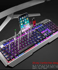Top Tier Gaming Keyboard And Mouse Combo With Rgb Backlit Mechanical Feel Keys Large Mouse Pad Handy Organizer Tray And Hella Comfortable White Setup For Pc Laptop featuring RGB lights and phone holder.