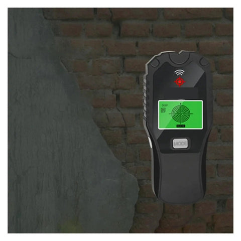 Badass Precision 5 In 1 Stud Finder And Wall Scanner displaying on a brick wall, detecting wood, metal, and live wires.
