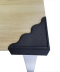 Keep Your Walls Pristine With These Tough Black Metal Corner Protectors Featuring Rust Resistant Build And Slick Smooth Edges For 3.7 Inch Wall Edge Shield Four Pack, showing a corner protector on a wooden surface.