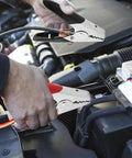 Heavy Duty 1100A Jump Starter Cable Clamps 4 Pack Insulated Battery Alligator Clips in use on car engine
