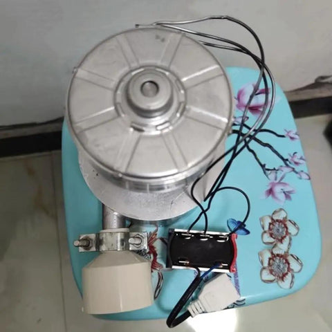 Top view of a 300W Portable Micro Hydroelectric Generator For Off-Grid Power On The Go 220V Water Turbine Generator on a table.