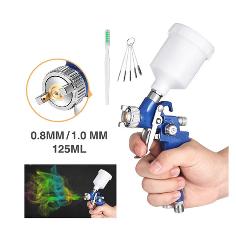 Pro Level Pneumatic Paint Spray Gun With One Millimeter Nozzle spitting even mist, 125ml clear fluid jar, lightweight hand-held design.