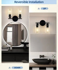 Snag This Top Shelf Matte Black Two Light Bathroom Vanity Fixture With Clear Glass Shades Solid Rust Resistant Construction Sconce installed above mirror and sink.