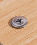 Fifty Pack Of Number 10 By 2 Inch Phillips Wafer Head Self Drilling Screws crafted from tough 410 stainless steel on wood.