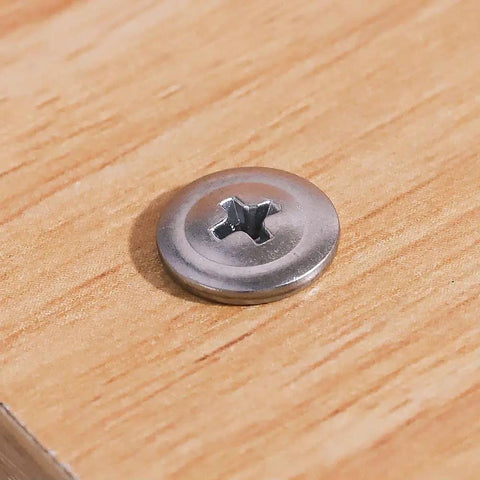 Fifty Pack Of Number 10 By 2 Inch Phillips Wafer Head Self Drilling Screws crafted from tough 410 stainless steel on wood.