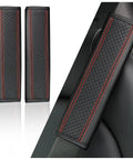 Universal Car Seat Belt Cover Pads Crafted From Breathable Leather With Thick Soft Sponge Padding, black with red stitching.