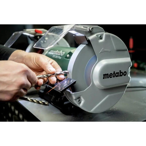User sharpening a drill bit on a Heavy Duty 8 Inch Bench Grinder With 3600 Rpm And 5.5 Amp Motor delivering top shelf shop performance.