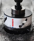 Lenox 2-3/4 in bi-metal speed-slot hole saw mounted on drill arbor; silver body with red Lenox logo