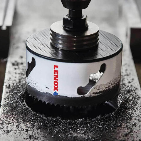 Lenox 2-3/4 in bi-metal speed-slot hole saw mounted on drill arbor; silver body with red Lenox logo