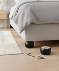 Solid Wood Furniture Leg Cylindrical Foot For Sofa Cabinet And Table Black 2.4 By 1.8 Inches Replacement Leg shown near bed