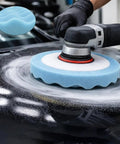 8 Inch Blue Ultra Soft Foam Buffing Pad For Auto Detailing And Paint Correction Heavy Duty Polish Tool in use on a car surface.