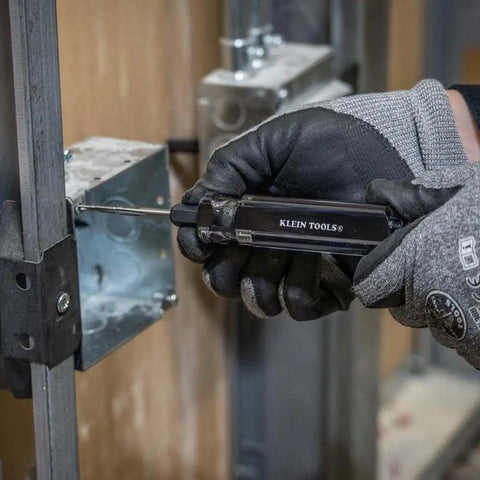 Person using Six In One Tapping Tool For Quick Thread Repair And Re threading on metal surface with glove, holder visible.