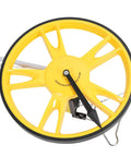 Close-up of Marhynchus Distance Measuring Wheel, Portable Design 9999.9m Accuracy, yellow wheel and metal handle.