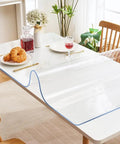 Clear 14x24 Inch Desk Blotter Mat Transparent PVC Table Protector Pad For Small Offices on dining table with food and decor