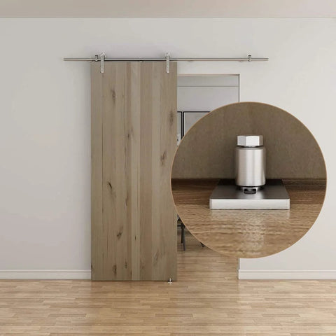 Stainless Steel Sliding Door Guide For Barn Doors 1 Pack With Flush Bottom Design Fits Doors Up To Two And One Eighth Inches Thick Durable Floor Guide Quiet Operation 304 Stainless Steel Rollers Ideal For Modern Interiors, shown installed on wooden barn door.