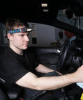 Man using I Match 3 Rechargeable COB LED Headlamp With All Daylight Function 5 Color Temperatures For Pro Detailing And Color Matching 250 Lumen Hands Free Work Light in car interior detailing