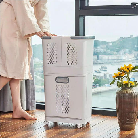 Removable Laundry Basket With Sturdy Storage Rack On Wheels White Household Organizer next to window with scenic view