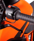 Next Level Badass Clutch Lever For Motorcycle Handlebar Bike Upgrade Parts Lightweight Anodized Aluminum Control Arm With Smooth Grip Street Track Ready Factor X Series Matte Black Fxcl31B close-up view showing the lever and grip on a bike handlebar.