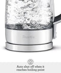 Crystal Clear Glass Electric Kettle With German Schott Glass Soft Opening Lid Gentle Steam Release Ergonomic Handle BPA Free Auto Shut Off Boil Dry Protection Easy Pour Fast Boil For Breakfast Tea And Coffee close-up with boiling water