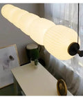 White Glass Bulb Chandelier Long Glass Pendant Lamp for Bedroom Living Room Restaurant LED Pendant Light, overhead view with soft lighting.