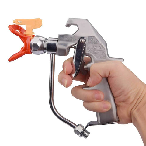 Hand holding High Pressure 5000 PSI Airless Paint Spray Gun With Base And 517 Tip Silver Pro Sprayer for DIY Projects