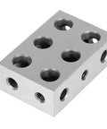 Angled top view of hardened steel 1-2-3 machinist block with 11 holes for setup.