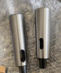 Two steel Morse taper adapter sleeves (2/3) for lathes and drill presses, front and side views.