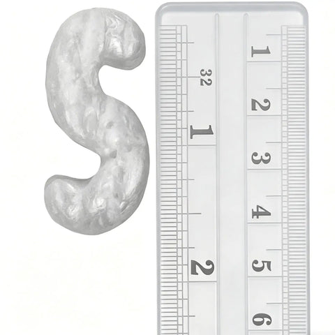 Boss Level Anti Static Packing Peanuts For Shipping And Moving Slick Loose Fill Void Cushion Material 30 Gallon Bag Covers 4 Cubic Feet spooled packing peanut with ruler for size reference.