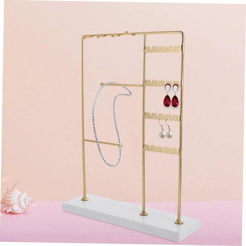 Spin Your Daily Drip Easily With This Smooth Rotating Jewelry Tree Stand Constructed From Premium Iron And Solid Marble For Necklaces And Earrings Storage, showcasing necklaces and earrings.
