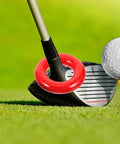 Weighted Golf Swing Rings Set For Quick Warm Up And Skill Mastery Portable Training Accessories near golf club on grass.