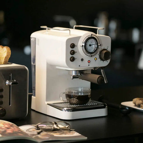 Retro Semi Automatic Espresso Maker Featuring 15 Bar Pump And Heavy Duty Stainless Steel Body With Built In Milk Frother Plus Complete Cappuccino Kit, with coffee cup.
