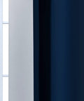 Close-up of Blue And Gray Ombre Curtain Panels 63 Inch Length Two Pack, Room Darkening Gradient Window Drapes, hung on a window.