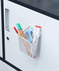 Magnetic Pencil Holder Mesh Stainless Steel Pen Basket With Three Strong Magnets fixed on whiteboard holding pens and scissors.