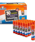 Disappearing Purple School Glue Sticks 7 Grams, 30 Count Pack For Classrooms, visible box and arranged glue sticks