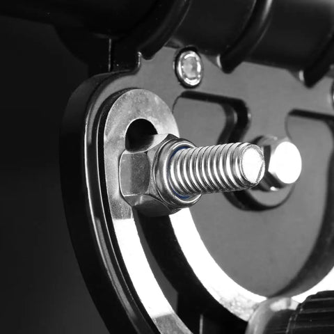 Close-up of Top Shelf M6 X 1.0mm Nylon Insert Hex Lock Nut on a machinery part, showcasing bright stainless steel finish.