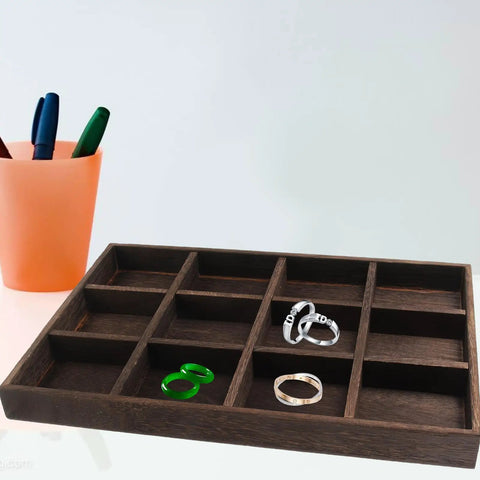 Go-To Pine Wood Jewelry Tray With Twelve Secure Grid Slots For Rings Keys And Wallets, showing rings in organized slots.