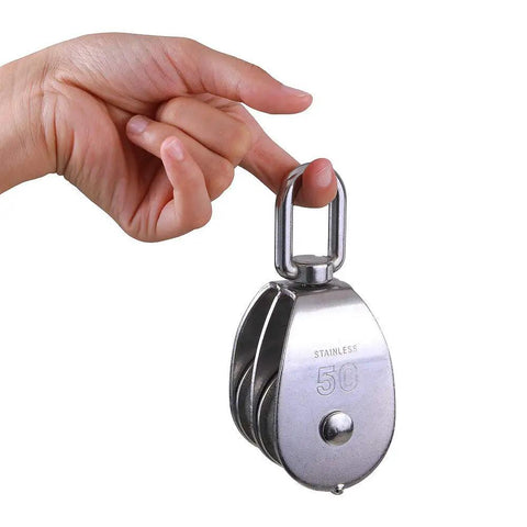 Hand holding 2 Pack M50 Lifting Double Pulley Block made from 304 stainless steel with swivel hook, heavy duty rigging gear