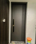 Two Sided Aluminum Door Handles 70.8 Inch With Push Pull Bar In Black And Gold Built To Last For Wood Barn And Sliding Glass Doors Exterior And Interior Hardware That Feels Smooth And Durable installed on a modern door.