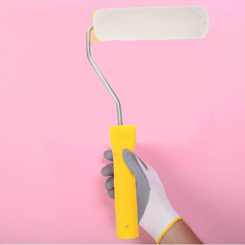Pro grade mini fleece roller in hand, yellow handle, white fleece cover for smooth wall painting, Make Your Next Wall Painting Project A Total Breeze With These Pro Grade Mini Fleece Rollers That Apply Paint Effortlessly And Deposit A Smooth As Glass Finish Wherever Your Brush Lands.