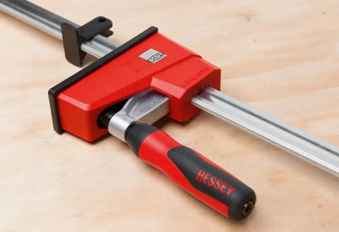 K-BODY REVOlution 12 Inch Parallel Clamps With Composite Plastic Handle And Three And Three Quarters Inch Throat Depth Two-Pack Delivers Up To 1700 Lbs Clamping Force For Heavy Duty Glue-Ups Smooth Action And Quick Setup with close-up on handle