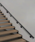 Wall Mounted Stair Handrail Crafted From Premium Stainless Steel Featuring A Sleek Black Square Profile Built Like A Tank For Indoor Spaces Loaded With Rock Solid Grip And Holds Down Weighty Loads Up To Two Hundred Pounds Safely, installed along steps.