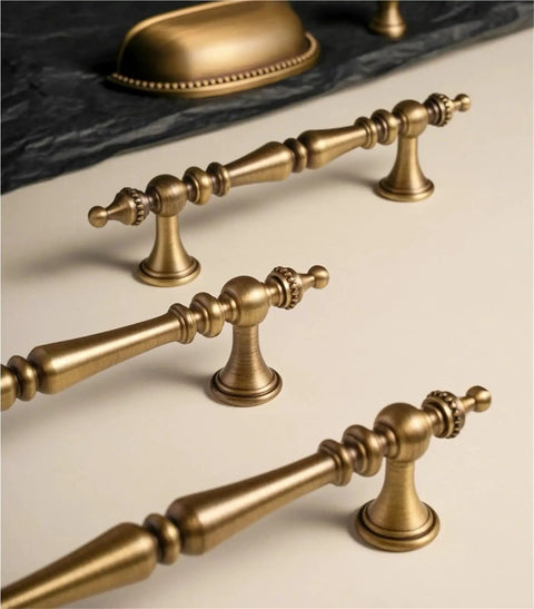 Vintage Cabinet Pulls 2 Pack Antique Brass Crown Shape Handles with 96mm hole spacing on light surface.