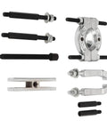 Thinking Process: 9-piece steel bearing puller tool kit with bolts, clamps, and gear puller jaws for auto hub removal