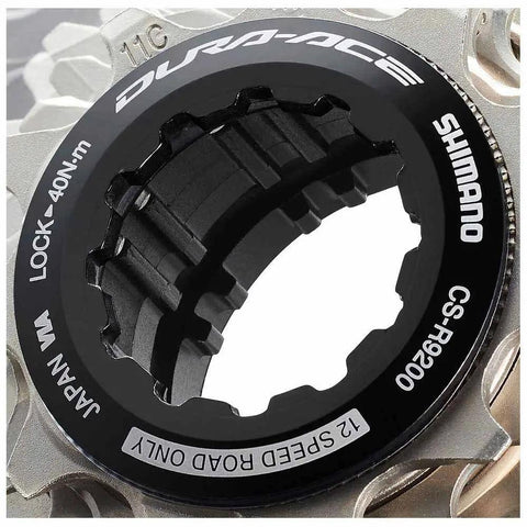 Close-up of 12-Speed Road Bike Cassette 11-30T HG Plus Lightweight Cog Set showcasing the lockring and titanium sprocket design.