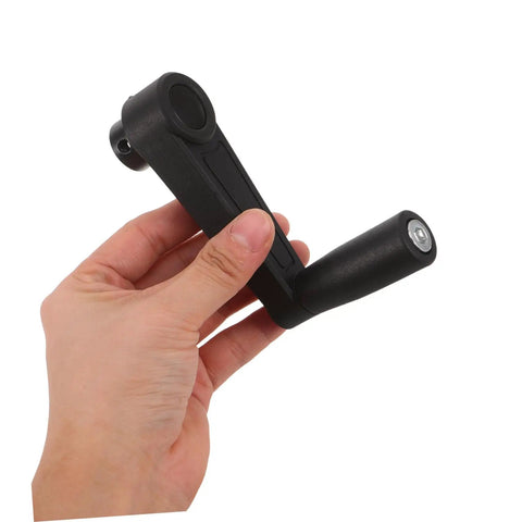 Universal 10 Mm Round Hole Cylindrical Crank Handle For Mechanical Generators Smooth Black Plastic rotary grip held in hand.