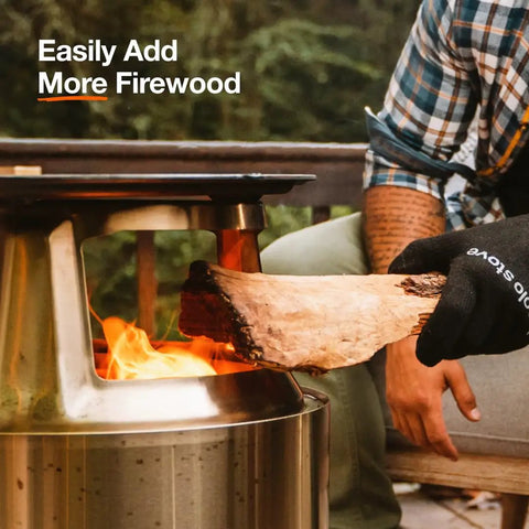 Bonfire Grill Top And Hub Cast Iron Cooktop With Stainless Steel Hub for 8 Inch Elevation Add On in use with firewood